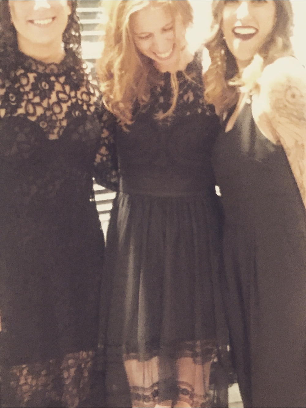 BEBE Sheer black lace formal dress